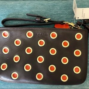 NWT COACH Legacy Grommet Wristlet Mahogany/Orange